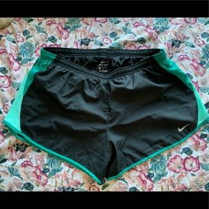 Black and turquoise Nike dri-fit running shorts L